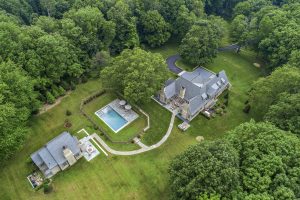 French Country Home with pool house by Nordic Construction